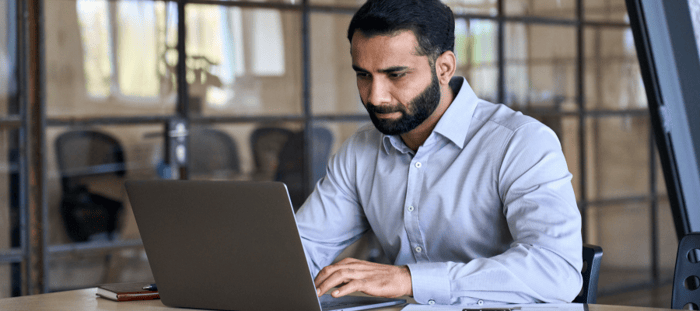 a man using integrated hr software